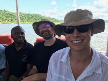 (Figure 4. Severin-left, Graham-middle and myself-right on a chain ferry across the river of Pangani)